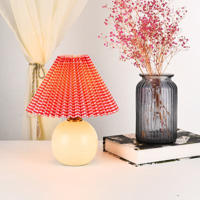 China Modern Nordic Modern Fabric Girls Desk Lamp Retro Decorative Pleated Bedroom Shade Ceramic Table Lamp for sale