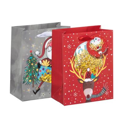 China ISO Factory Gold Handmade Stamping Christmas Small Gift Shinning Paper Bag With Ribbon Handle for sale