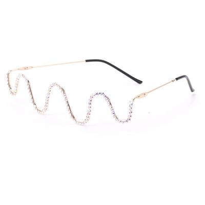 China Fashion Sunglasses New Fashion Diamond Half Frame Glasses Metal Handmade Wave Frame Decorative Women Eye Rimless Frameless Sunglasses for sale