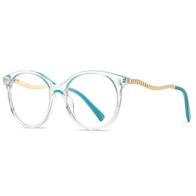 China Fashion Around Glass Frame Glasses Tr90 Cat Eye Crystal Eyewear For Metal Legs Anti Blue Light Women for sale