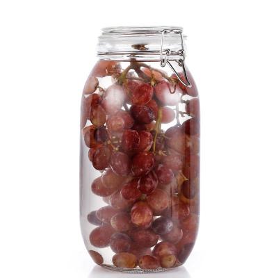 China Multifunctional Eco-friendly Freshness Preservation Food Storage Empty Glass Jars Kitchen Glass Jars With Airtight Wrinkled Lids for sale