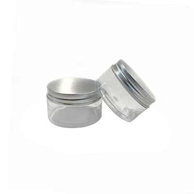 China Yueyi 100ml Small Cosmetic Empty Clear Round Aluminum Lid Mini Cosmetic Plastic Jar Powder Containers Skin Care Face Cream Jar for sale