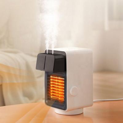 China Fashional Factory Hot Selling Mini Electric Warm Fan Heater Portable Humidifier Strip Household Ceramic Desktop Fan for sale