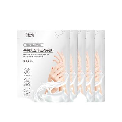 China 2022 Hot Selling Replenishing Moisturizing Hand Whitening Mask With Rosa Rugosa Flower Oil Hand Mask Beauty Wax for sale