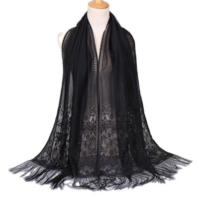 China New Monochrome Cavity Solid Color European American Fringed Shawl All Match Lady Wholesale Shawl Fringed Scarf Bandana for sale