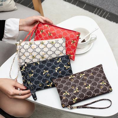 China Fashion New Style Waterproof PU Four Section Clover Zipper Cheap Leather Wallet New Long For Women for sale