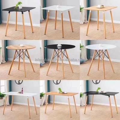 China MDF table top and wooden legs factory supply cheap home kitchen table dining with wooden legs high quality white black wooden dining tables for sale for sale