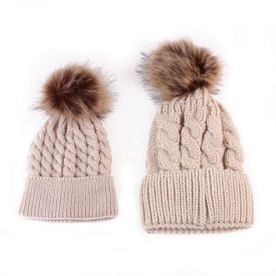 China 2021 COMMON New Style My Miyar Mom And Baby Hat With Pompom Faux Fur Beanie Kids Acrylic Knitted Parent-Child Winter Warm Hats for sale