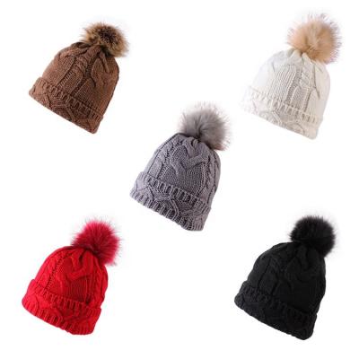 China 2021 New Style Women's Custom Made Winter High Quality Pom Embroidered Knitted Beanie Hat for sale