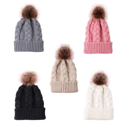 China 2021 New Style Custom Women's Winter Acrylic Common Cable Knit Hats With Leather Patch for sale