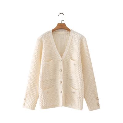 China Breathable Solid Color Pocket Winter Knit Fashion Loose Cardigan With Gold Buttons for sale