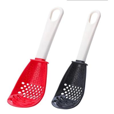 China New Good Quality Viable Multifunctional Kitchen Cooking Spoon Hole Potato Garlic Press Innovative Heat Resistant Hanging Colander for sale