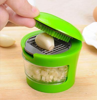 China Multi Viable Functional Kitchen Cooking Instruments PP Material Colorful Plastic Vegetable Mini Garlic Grater And Cutter Box Cleavers for sale