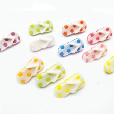 China Creative Plastic Slipper Shape Leg Baby Buttons Part Combined Dry Cleaning Flip Flops Two for sale