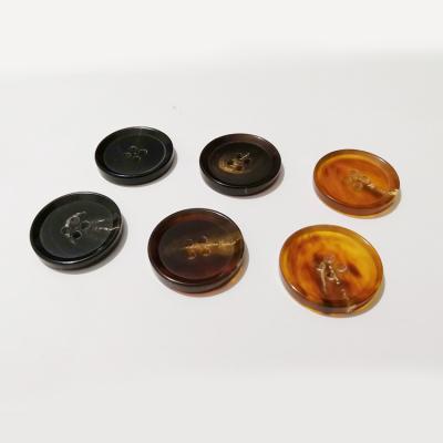 China Viable Pointed Tip Four Holes Around Real Buffalo Horn Button For Coat Overcoat for sale