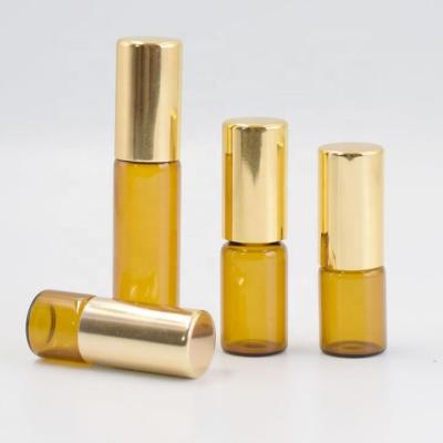 China Personal Care 3ml 5ml 10ml Clear Roller Glass Bottle Perfume Sample Roll-On Bottle Gold Top Cap for sale