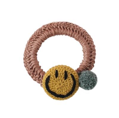 China Main Korean Hair Accessories Headdress Fashionable Smiling Hand-woven Smiling Hair Ring Woolen Rope Face Rope Ball Head Elastic Band for sale