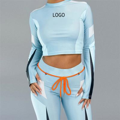 China Women Breathable Casual Fitness Sets Sportswear Long Sleeve Workout Letter Print Tracksuits Fashion Crop Tops And Pants Matching Set for sale