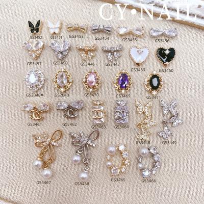 China Luxury CY Nail Accessories Diamond Gold Coating Glitter Zircon Luxury Nail Jewelry for sale