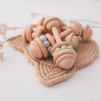 China Teething Toy Wooden Baby Rattle Teether Soft Chewable Infant Rattle Toys for sale