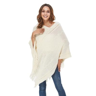 China 2021 Anti-Wrinkle Bat Wing Sleeve V-Neckline Plain Knitted Poncho Women Plus Size Sweaters For Shawls Tassel for sale