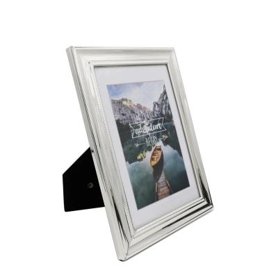 China Home decoration picture frame metal iron platedphoto frame hot saling table portrait rose gold picture frame for sale