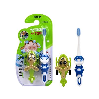 China Disposable Factory Directly Supply Cartoon Rubber Handle Flat Toy Kids Toothbrush for sale