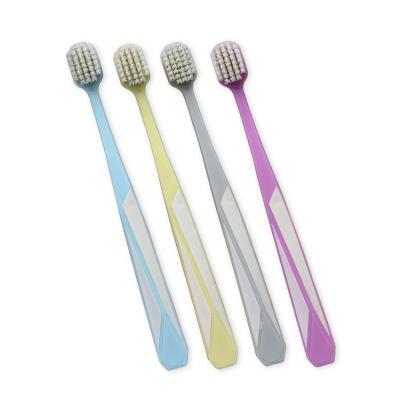 China Good Quality PBT Disposable Extra Large Clean Head Tapered Bristle Adult Toothbrush for sale