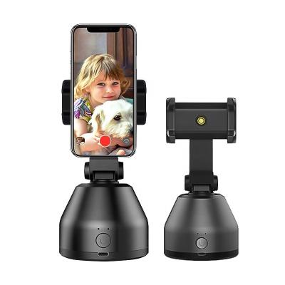 China Adjustable Portable Ai Sensor Smart Shooting Auto Selfie Face Tracking  360 Degree Rotation Smart Phone Holder USB Charging for sale