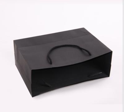 China Recyclable Shopping Black Paper Bag For Cloth Packing Paper Bag For Shopping Garment for sale