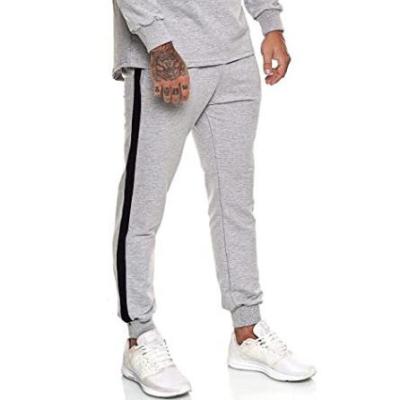 China Anti-Wrinkle Men's Fashion Sports Pants Cotton Fitness Training Color Matching Mid-Waist Straight-Leg Jogging Casual Pants for sale