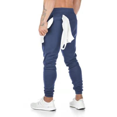 China Anti-wrinkle European and American Men's Sports Pants New Fitness Can Be Hung Towel Sports Pants Running Feet Training Pants for sale