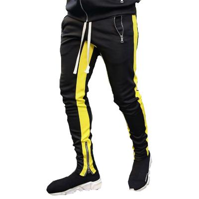 China Factory Direct Sale Men's Fitness Anti-Wrinkle Slim Pants With Zippered Cotton Leisure Outdoor Sports Running Pants for sale