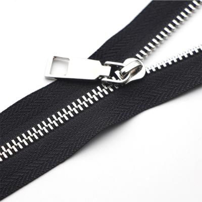 China Hot Selling Custom Metal Long Lasting Bilateral Brass Zipper And Zipper For Jeans for sale