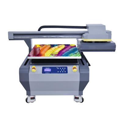 China UV inkjet a1 6090 printer ABS PVC wood metal etc. factory direct acrylic plastic leather glass topcoat for sale