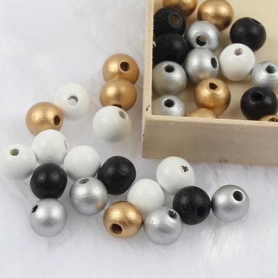 China Primary Color Safe Wooden Bead Latest Arrival Untreated Round Shaped Wooden Beads for sale