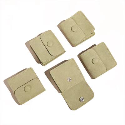 China Low MOQ Custom Logo Microfiber Pouch Button Flap Jewelry Packaging Pouch Eco-Friendly Bag for sale