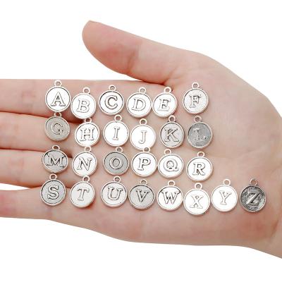 China 26pcs/set CLASSIC Letter A~Z Alphabet Charms Flat Round Disc Double Sided Alloy Charms For Jewelry Making DIY Bracelet Necklace S205 for sale