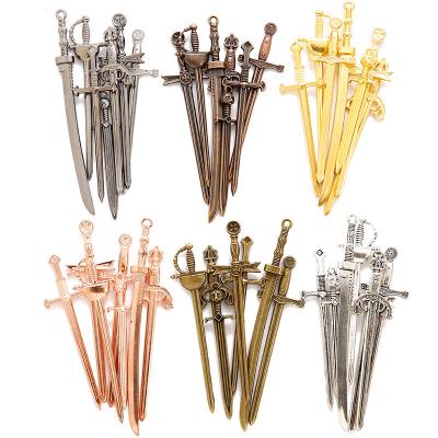 China Vintage 7PCS Long Set Antique Silver Weapon Mix Alloy Metal Charm Sword Pendant For Landmark Craft Jewelry Making 60mm for sale