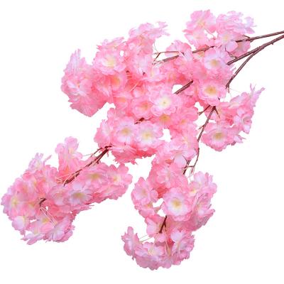 China Silk Flower Simulated Cherry Blossom Branch Wedding Ceiling Decorative Rose Bouquet White Red Flower for sale