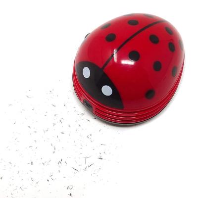 China Cute Car Beetle Beetle Cartoon Mini Desktop Vacuum Desk Dust Remover Portable Dust Sweeper (Red) for sale