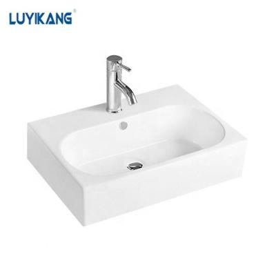 China Y148A High Grade Modern Ceramic Countertop Basin Bathroom Sink Vessel Irregular Table Top Wash Basin for sale