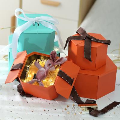 China Recycled Materials Octagonal Gift Box Valentine's Day With Hand Wedding Gift Box Cosmetic Lipstick Packaging Paper Box for sale