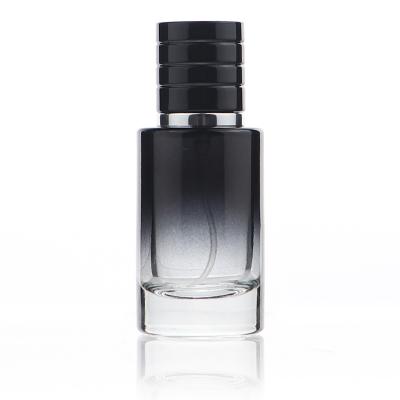 China Care Private Label Perfume 50ml Perfume Bottle Cylinder Personal Empty Black Perfume Bottle With Screw Cap for sale