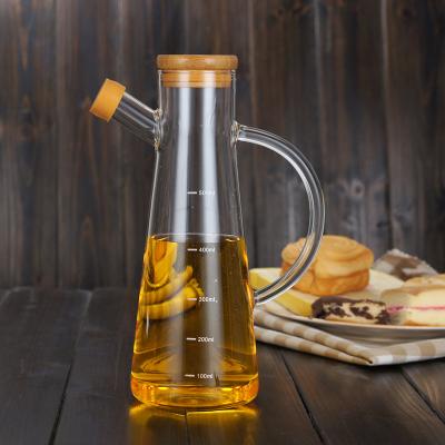 China Sustainable Kitchen Oil Jar Dispenser Borosilicate Cooking Vinegar Dispensers Edible Oil Sprayer Olive Bottle With Handle And Bamboo Lid for sale