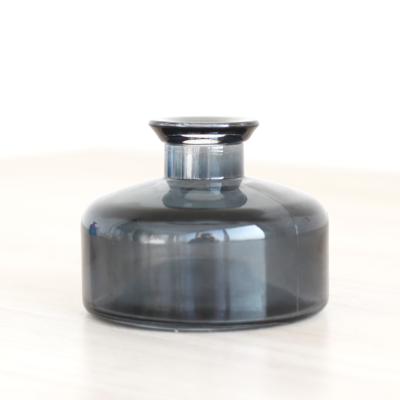 China Gift Printing Black Color Diffuser Essence Glass Bottle for sale