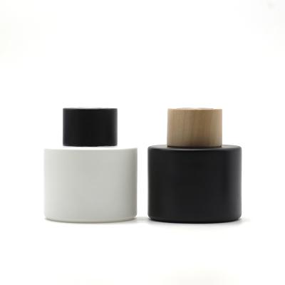 China Wholesale Black White Glass Reed Fragrance Containers Cylinder Diffuser Gift Bottles With Wooden Screw Top for sale