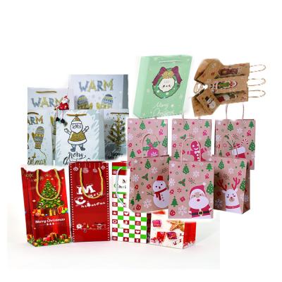 China Recyclable Kraft Paper Gift Bags Snowflakes Merry Christmas Candy Cookie Tote Bag Boxes New Year 2022 Natal Kids Favors Party for sale