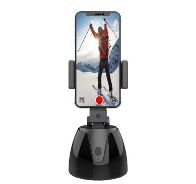 China 360 Rotatable Smart Tracking Adjustable Auto After Face Object Tracking Smart Shots Phone Mount Sensor Stand Personal Tripod for sale