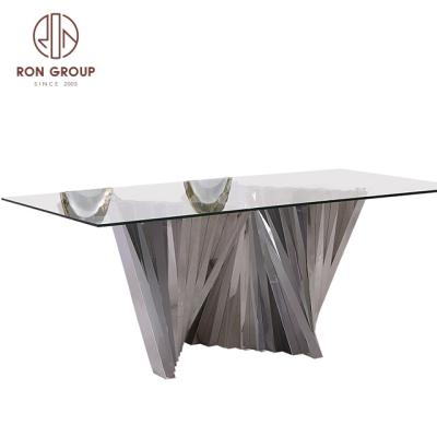 China Contemporary Rectangle Shape Glass Top Stainless Steel Legs Glass Dining Table for sale